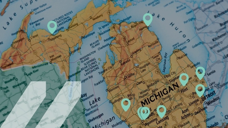 Image of a map of the state of Michigan, with flags marking the locations of the 10 MCAN birthday grantees