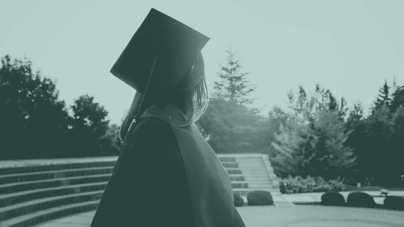 An image of a student in a graduation cap and gown